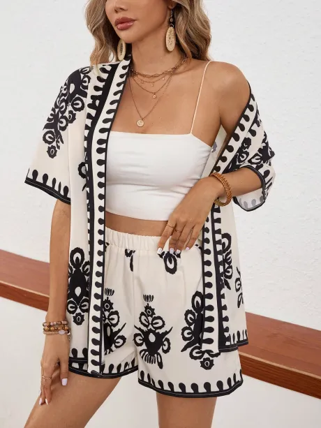 SHEIN VCAY Conjunto de duas peças femininas, sendo camisa de abertura frontal com estampa completa e shorts folgados para um look casual de verão. R$112,75